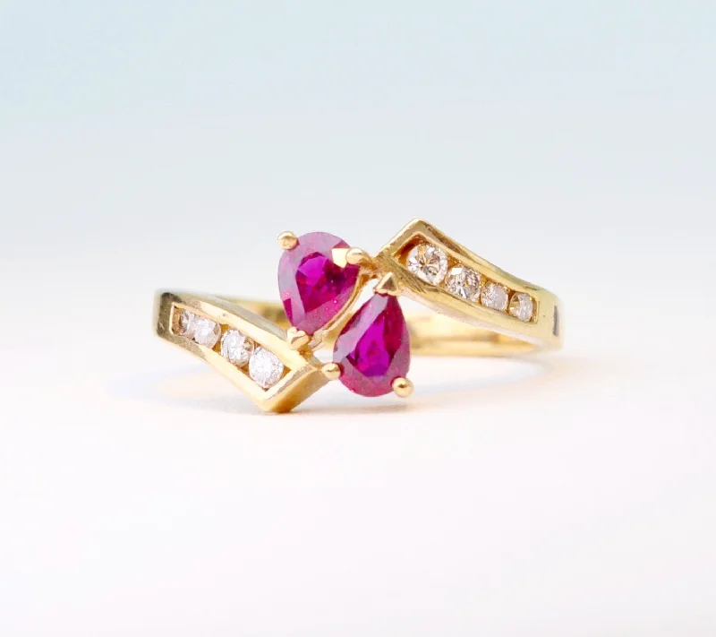 Tide design rings-14K yellow gold ring with 2 pear-shaped Rubies and 8 side Diamonds