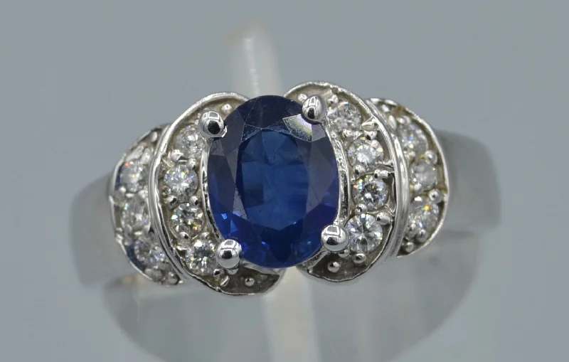 Bent shank rings-14K white gold ring with Blue Sapphire and diamonds