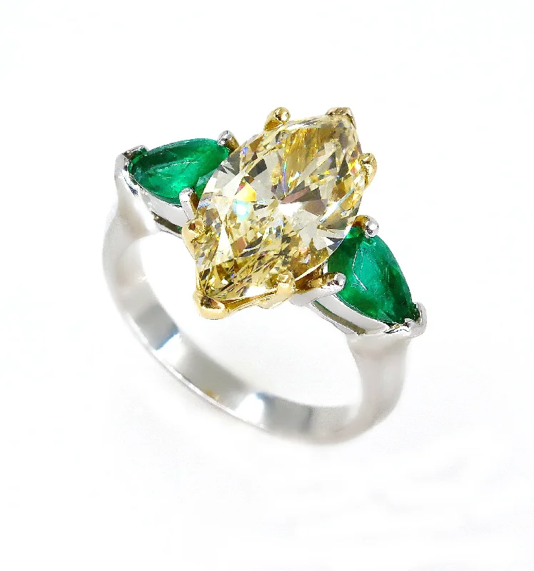 Sleek modern rings-Estate “Canary” 4.86ctw Natural Fancy YELLOW Marquise Diamond & Green Emerald Ring