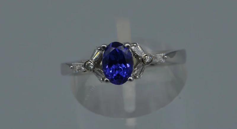 Glossy band rings-14K white gold ring with one center oval Tanzanite and six side Diamond baguettes