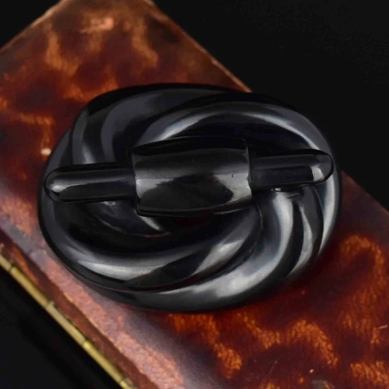 Sleek gold brooch-Antique Victorian Carved Whitby Jet Lovers Knot Brooch